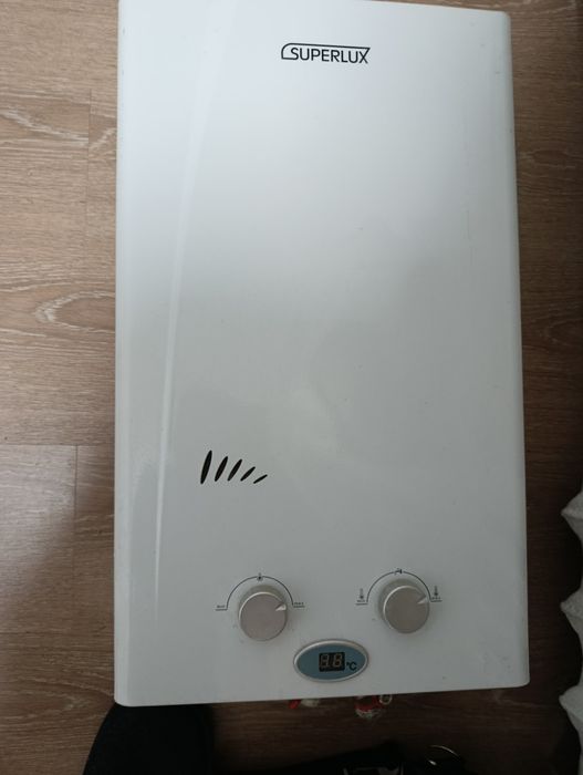 Продам газовый проточный водонагреватель