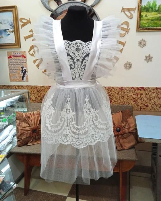 Школьные фартуки в ассортименте