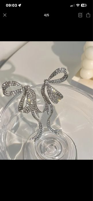 Продам серьги бантик