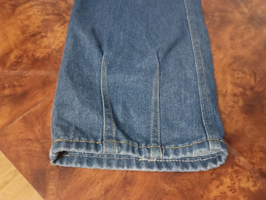 Новые синие джинсы