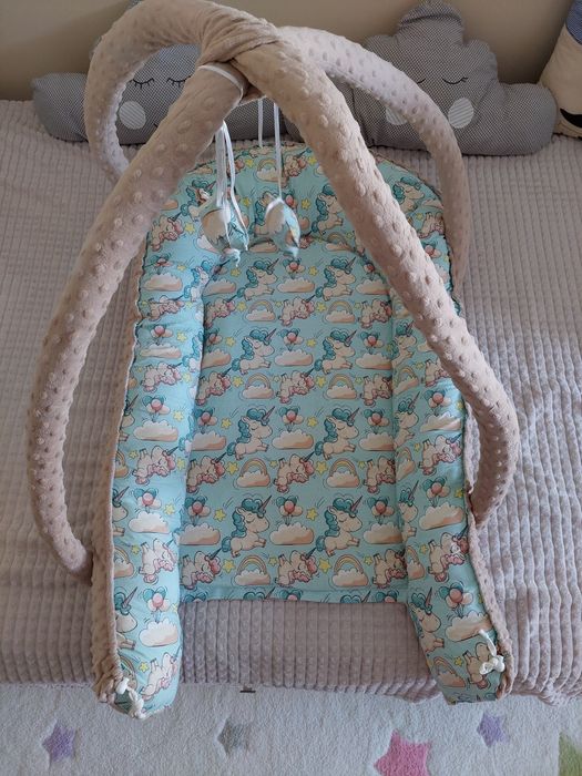 Бебешко гнездо с подарък