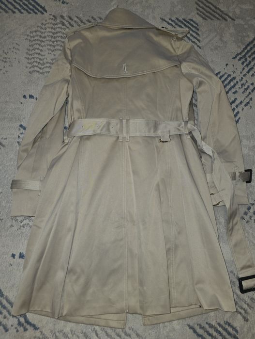 Продам тренч новый..