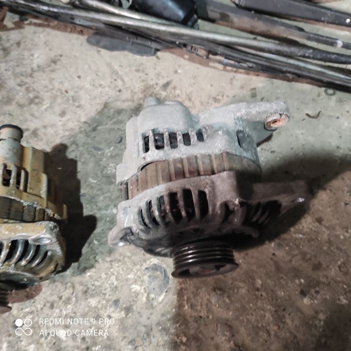 Продам генератор на Мазда 626 птичка