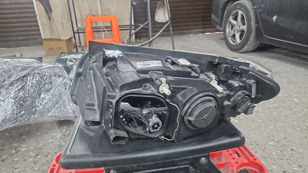 Фары на бмв х1 2011 года