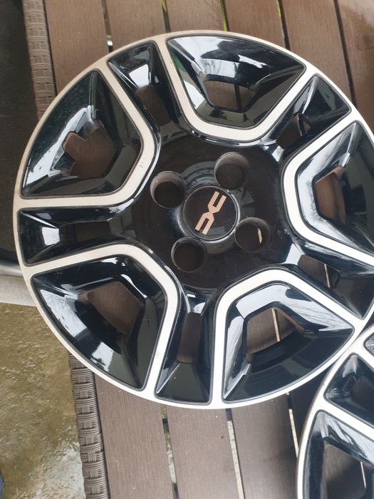 Capace DACIA SPRING 3(trei) bucati pe 15