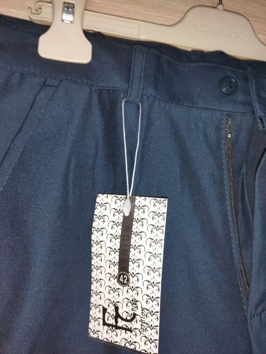 Новые школьные брюки 42 рр