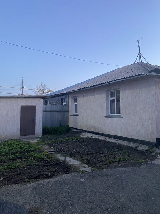 Дом с земельным участком