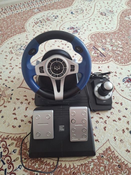 Продам детский симулятор руля с педалями