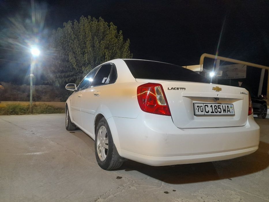 Ласетти 2011.  2 позится