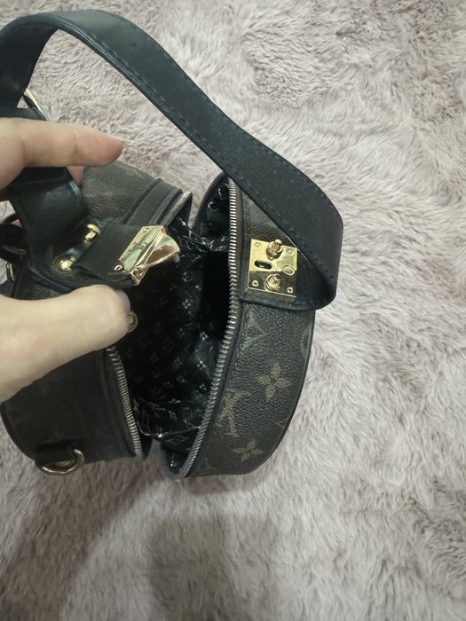 Кръгла малка чантичка LV