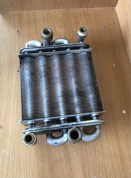 Продам теплообменник на Рига 18w