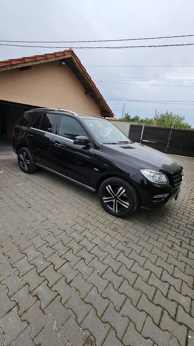 Mercedes ML -  schimb cu Miniescavator
