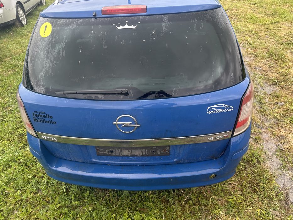 Capotă bară faruri haion  motor Astra H