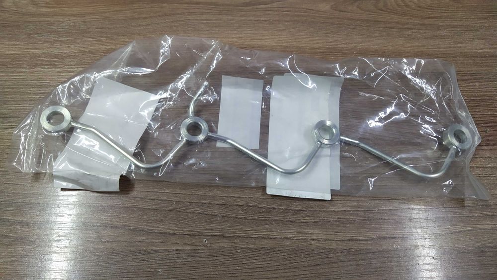 Трубка обратки топлива на TD27, QD32 в оригинале