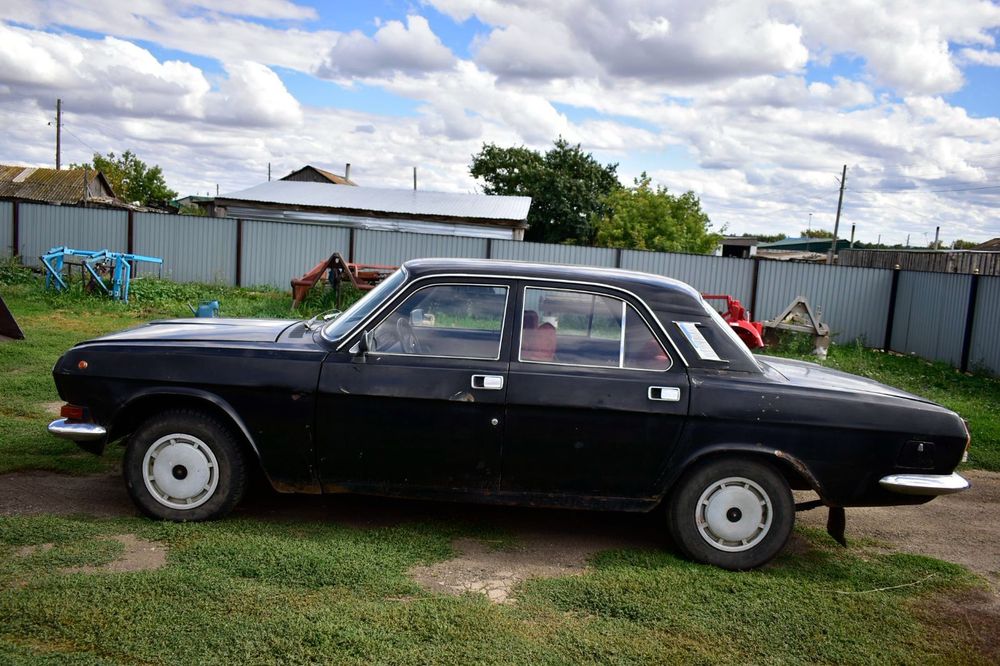 Автомобиль газ 2411