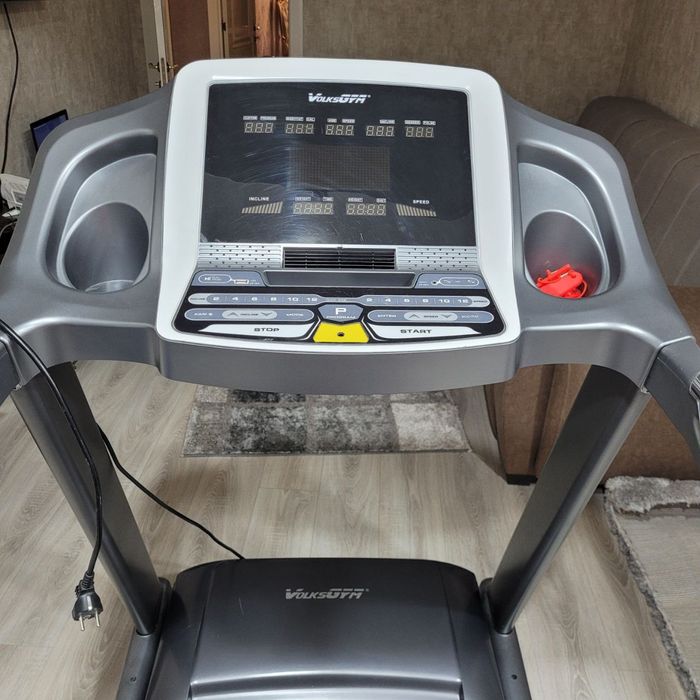 Беговая дорожка. Профессиональная, поднимет самых тяжёлых.