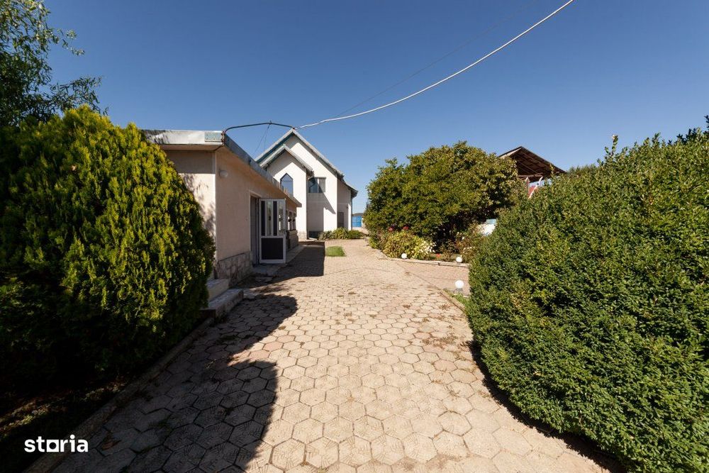 Casa visurilor cu livada roditoare si gradina amenajata Darmanesti-Arg