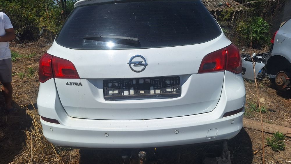 Capota tragar far opel astra j break 1.6 benzina gpl carlig remorca usa  motor cutie caseta directie