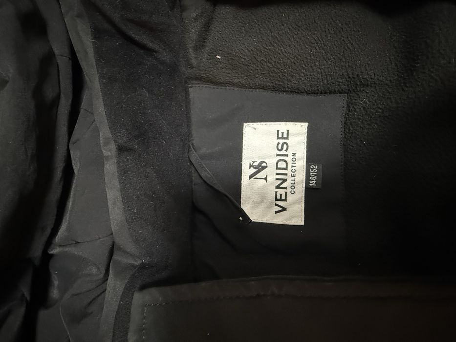 Продам зимнюю курту 146/152