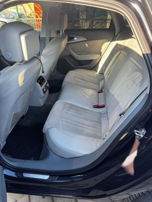 Vand Audi A6 automat,culoare albastra,interior gri cu piele alcantara.