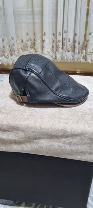 Кепка сотилади. Кожа. 56-58 размер.