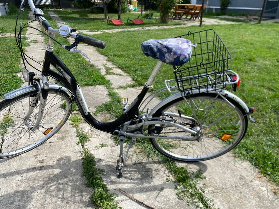 Bicicletă damă Hercules 28” City Bike cu suspensie și coș