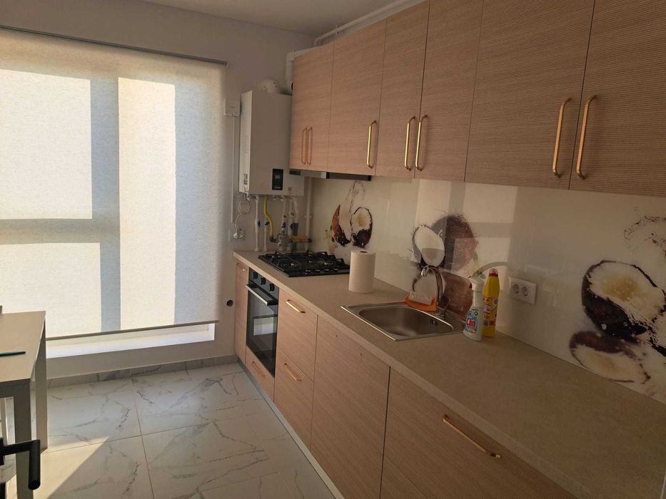 Inchiriez apartament cu 2 camere + parcare subsol