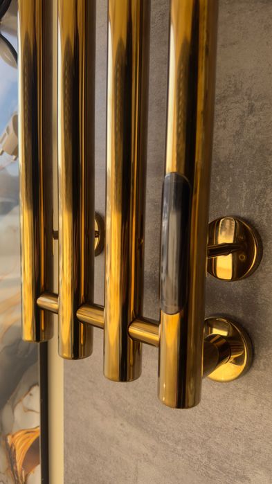 Золотой полотенцесушитель от производителя.