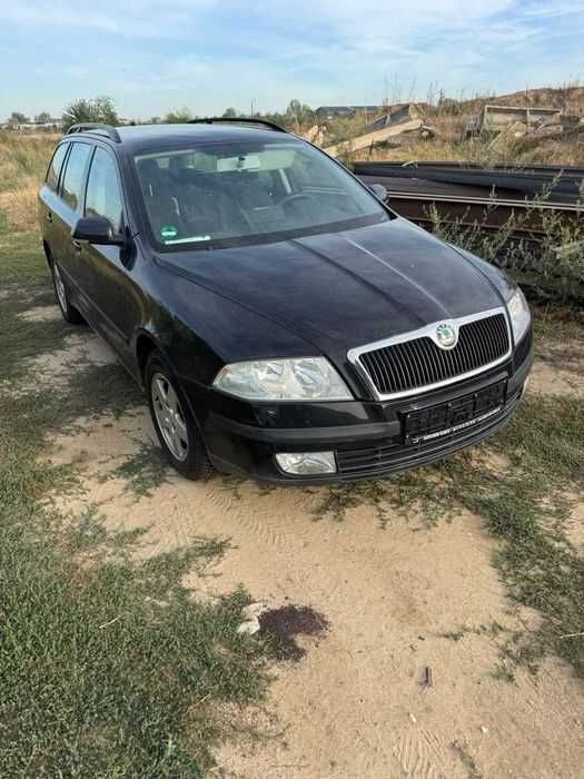 Piese Skoda Octavia 2 non facelift - negru - Bara fata , capota motor , trager , motor 1.9 TDI 105cp cod BKC , aripi usi manuala 5 trepte cutie JCR