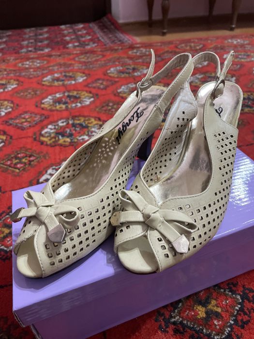 Женская обувь. Аёллар оёк кийими