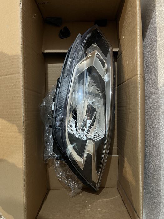 Бампер и фары на Оникс