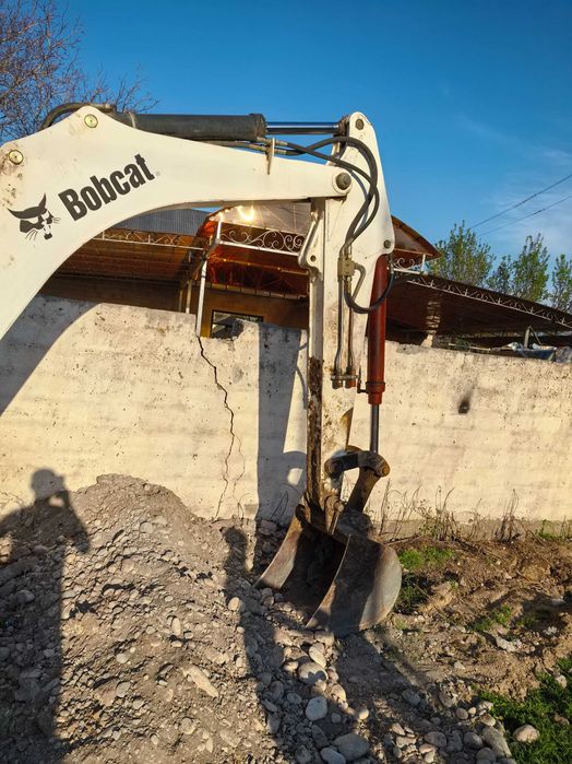 Экскаватор малютка гусеничный