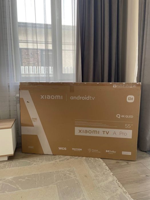 Телевизор Xiaomi A PRO 4K QLed вместе с тумбой