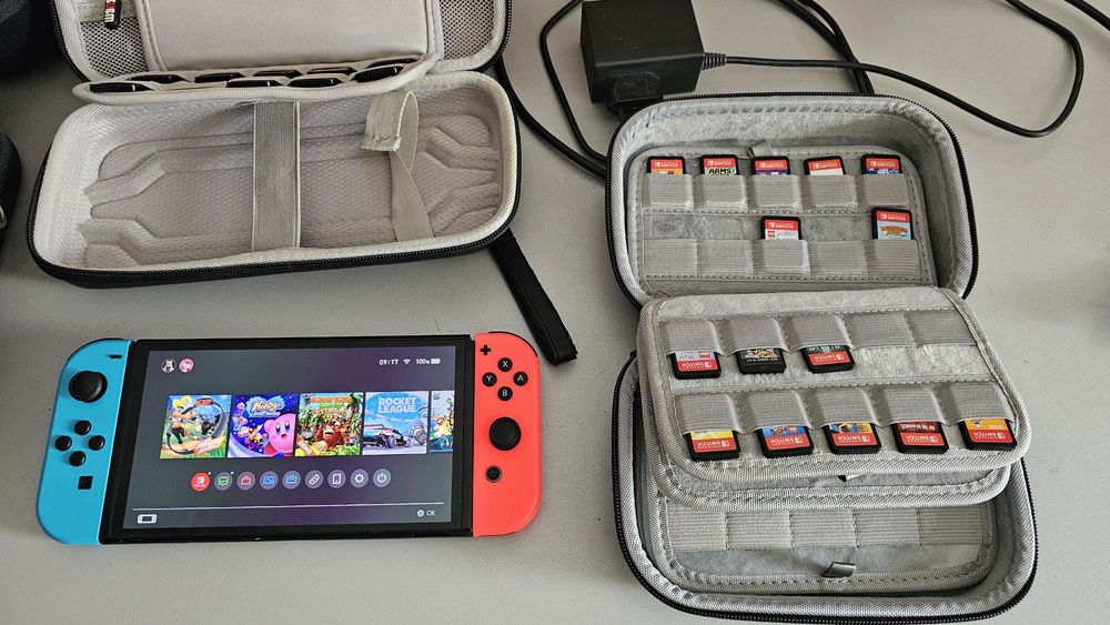 Vand Nintendo Switch OLED + 45 jocuri