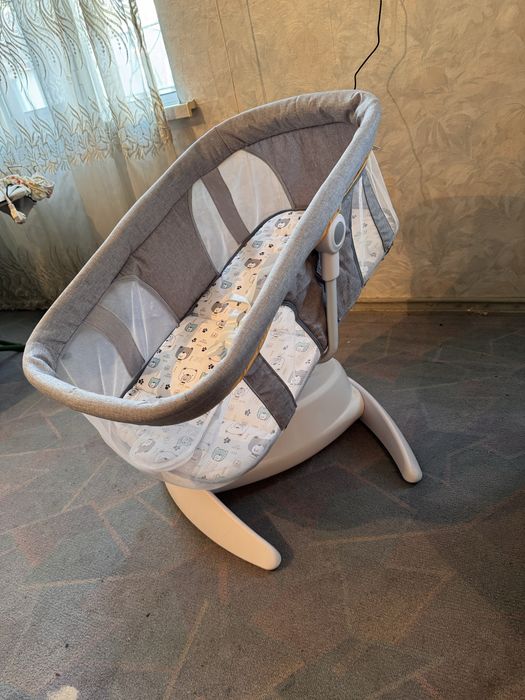 Детская кроватка с автоматическим укачиванием