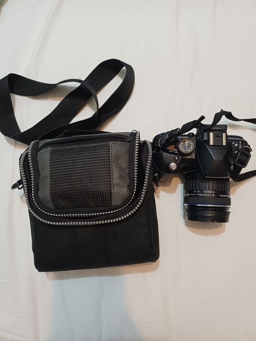 Vând Olympus E‑520 DSLR +Obiectiv kit 14‑42 mm inclus
