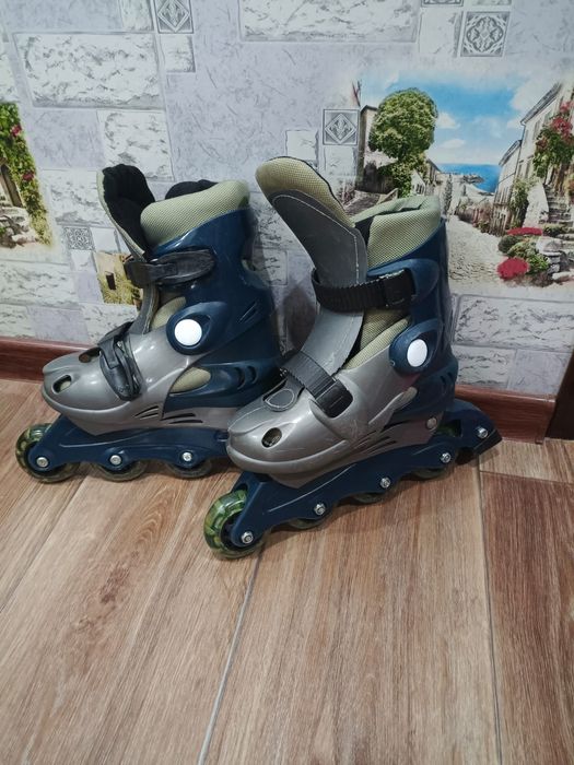 Коньки роликовые