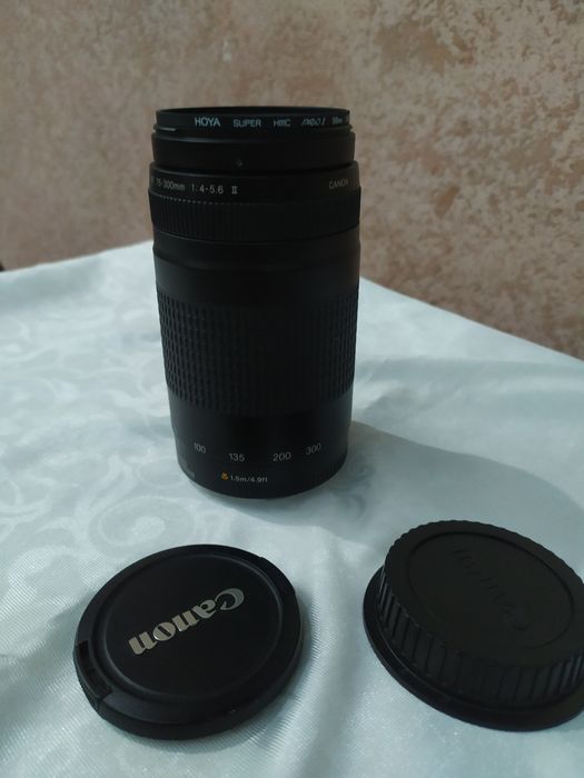 Foto aparat qoʻshimcha Binokili bilan