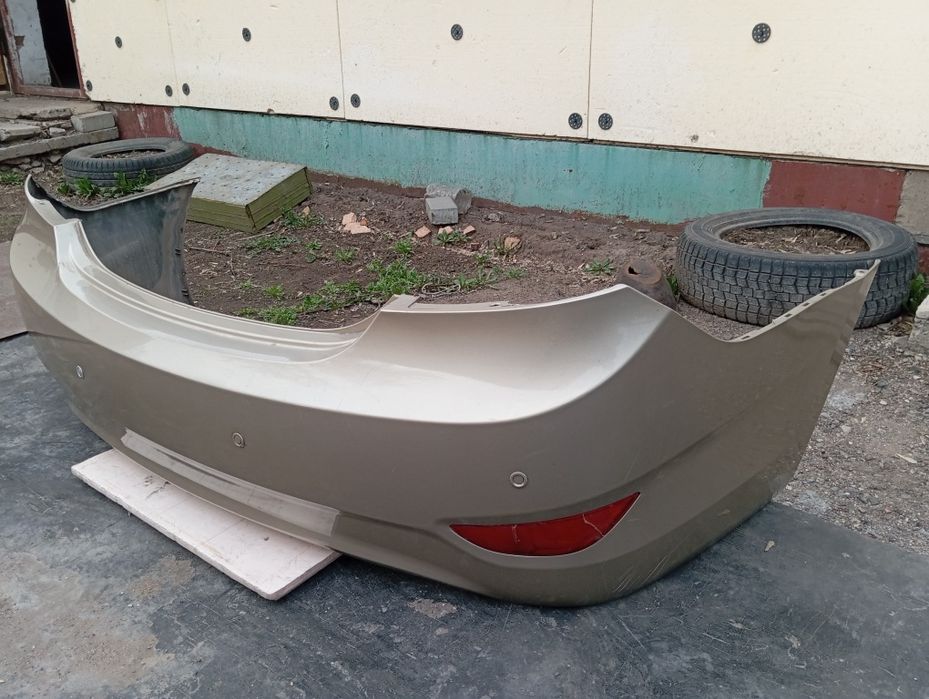 Бампер задний акцент 2011