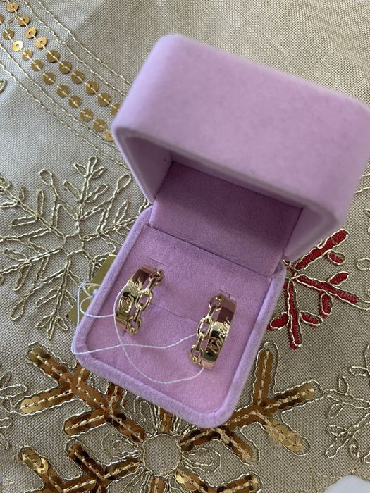 Золотые серьги Cartier