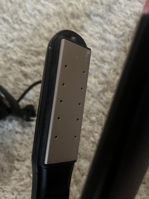 Placa de întins părul Remington