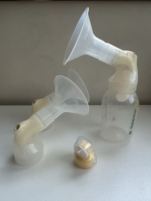 Електрическа помпа за кърма Medela Swing с бутилки и аксесоари