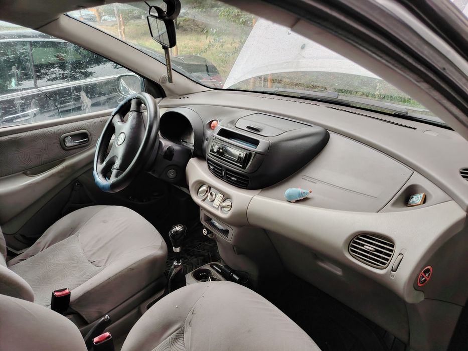 Нисан Алмера Тино