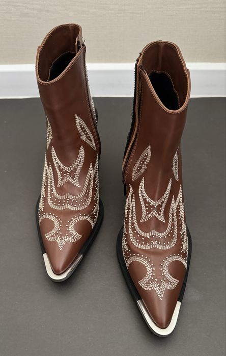 Продам новые кожаные ботинки