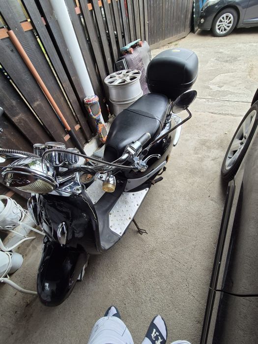 Scuter 50 cp an km putini