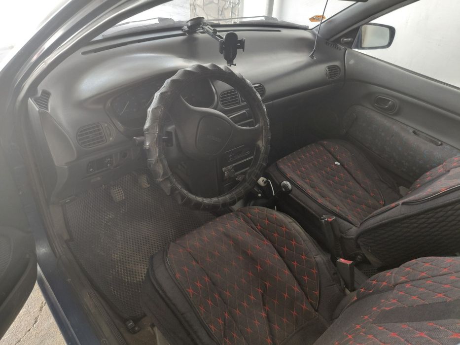 Продам Mazda 121
