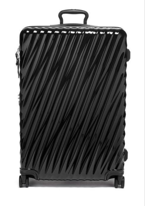 Продам новый чемодан Tumi