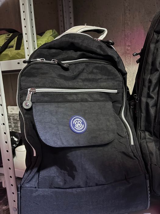 Рюкзаки и дорожные су