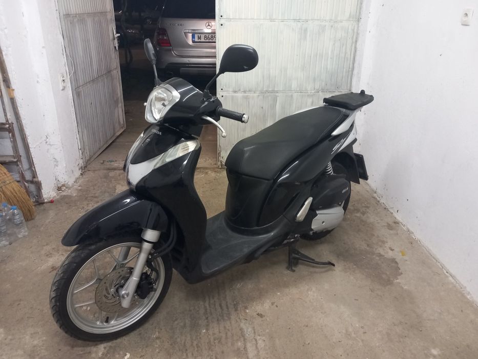 Honda sh 125 mode 2014г.