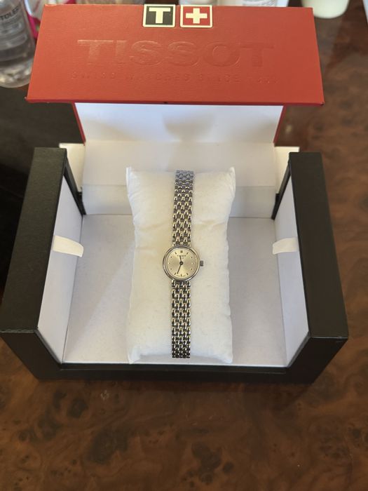 Часы тотисот новые